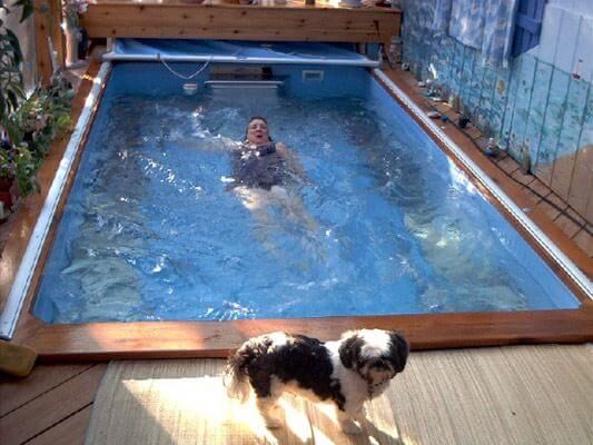 Regina does the backstroke in her Endless Pool