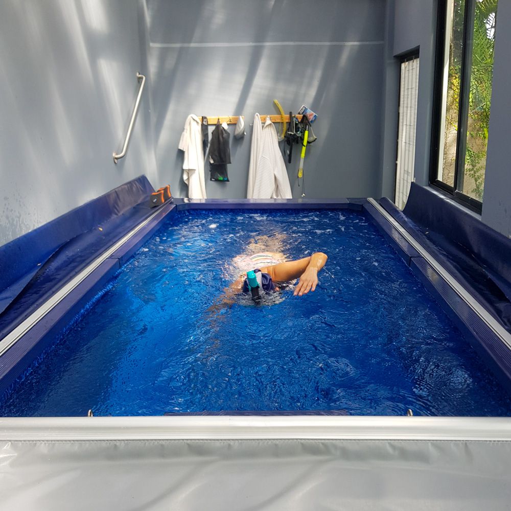 picture of Karol swimming in her Endless Pools Streamline pool