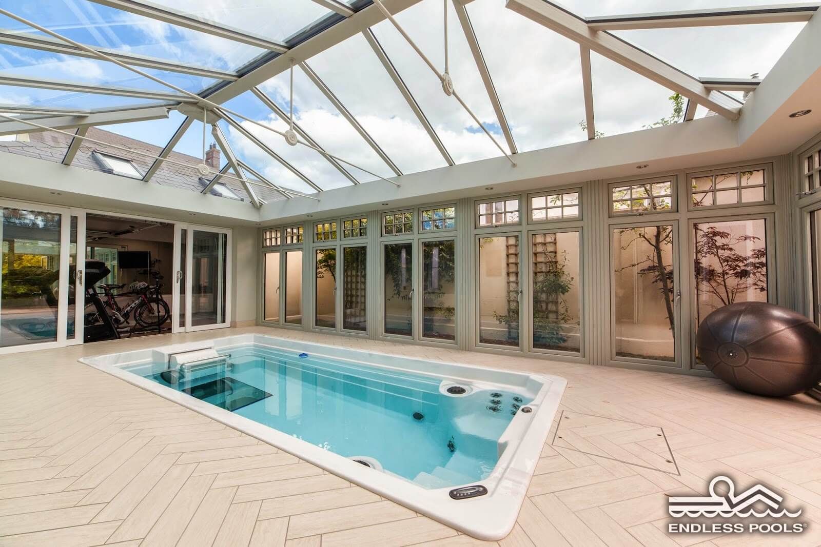 a conservatory installation of an Endless Pools Swim Spa