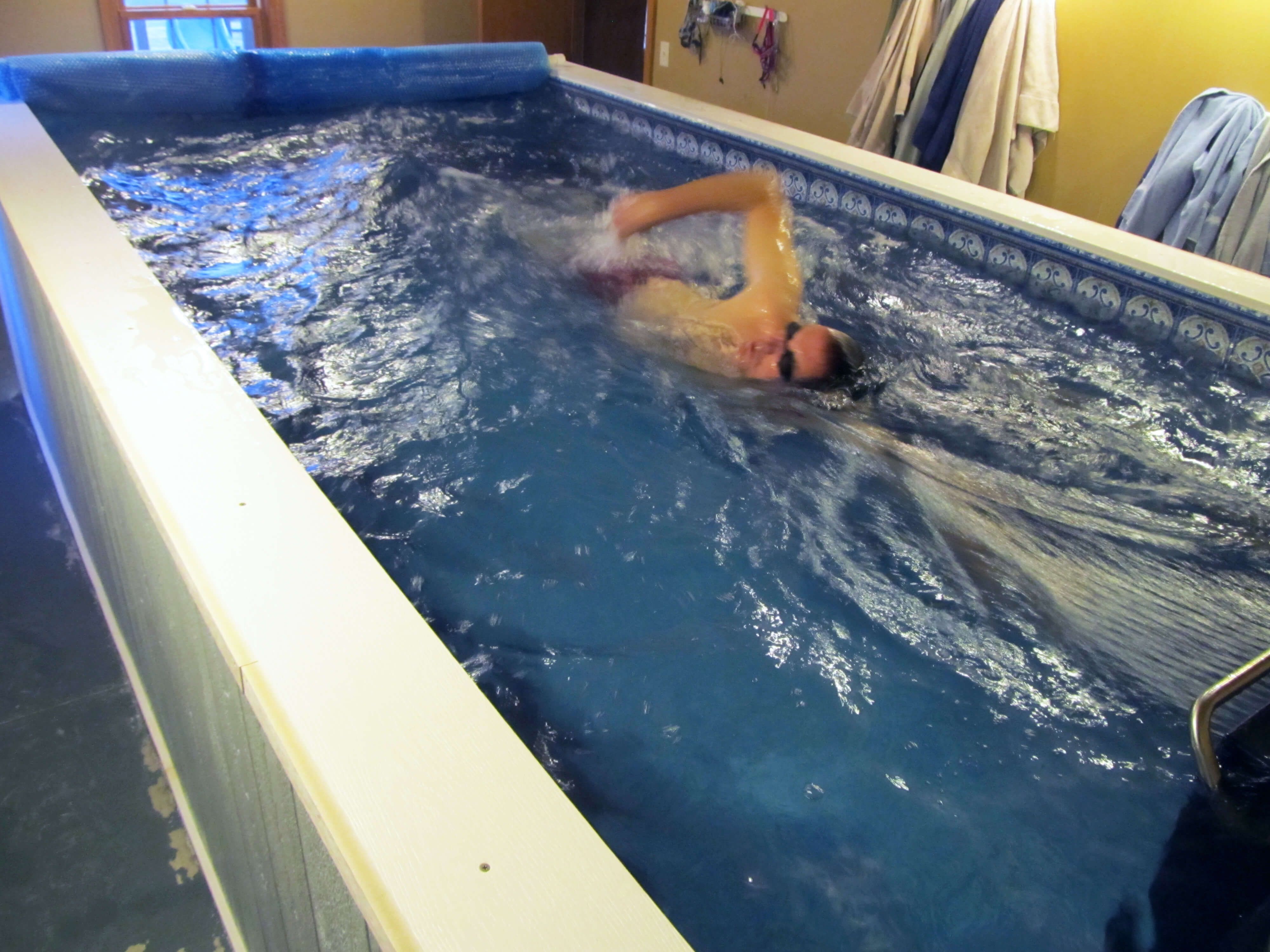 photo of one of Mike's daily swims in his basement Original Endless Pool for spinal stenosis pain management