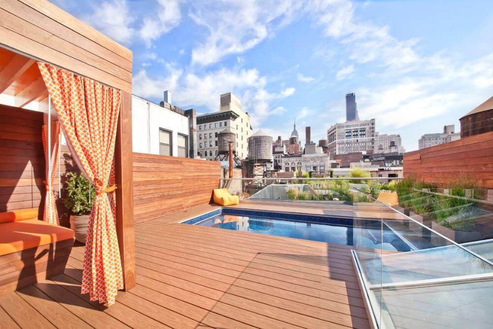 picture of a rooftop Endless Pools model with an adjacent cabana