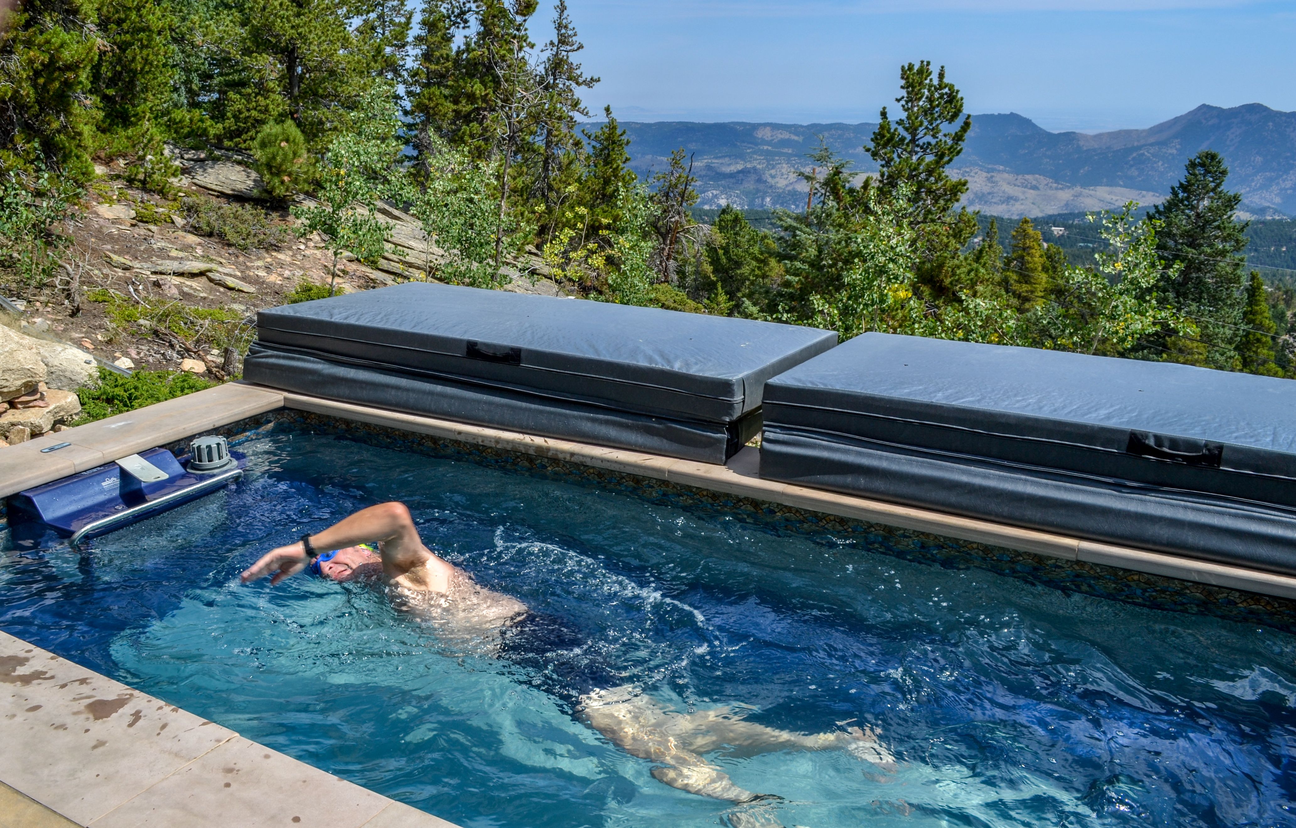 picture of triathlete training in an Endless Pools Performance pool on a hill